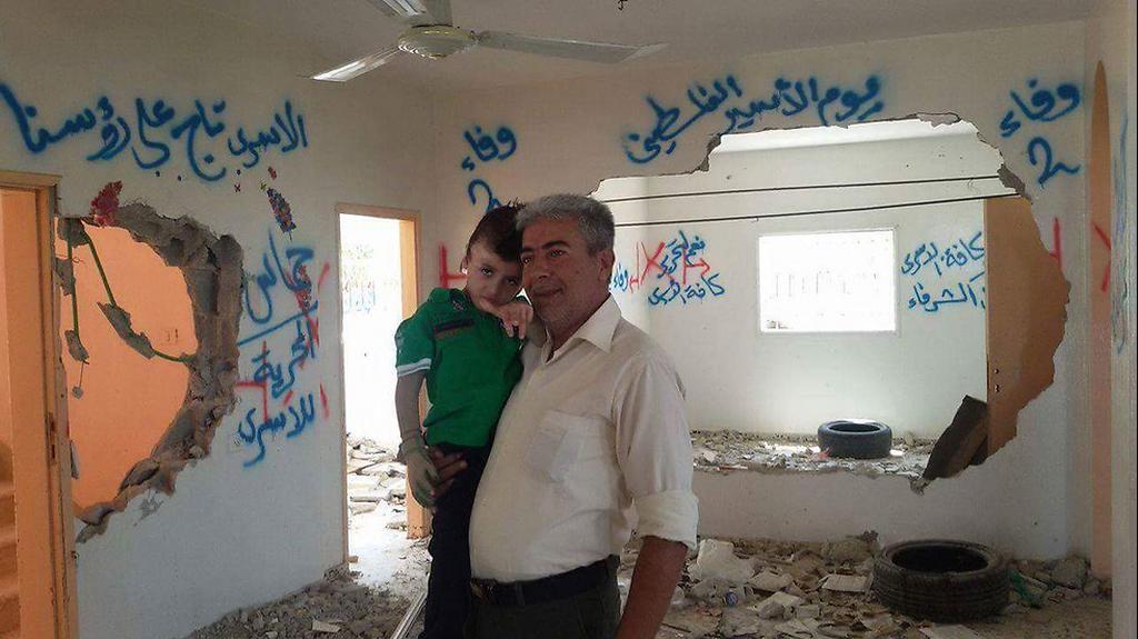 Ahmed Dawabsha who survived the fire, at the house that was attacked 