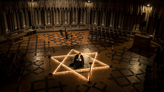 Candles lit in a British church on International Holocaust Remembrance Day 