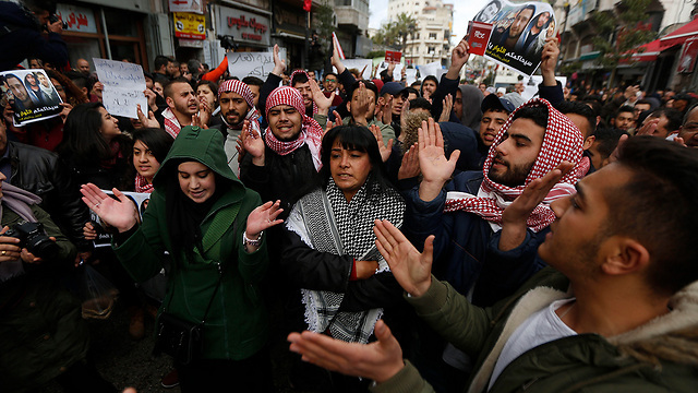 A Palestinian protest in Ramallah against PA security cooperation with Israel (Photo: AP) A Palestinian protest in Ramallah against PA security cooperation with Israel