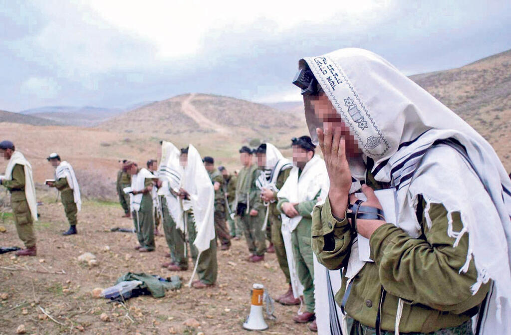 Haredi IDF soldiers pray Haredi IDF soldiers pray