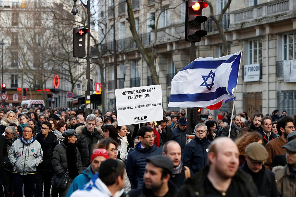 צילום: רויטרס עצרת לזכר מיריי קנול ש נרצחה פריז צרפת אנטישמיות