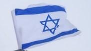 דגל ישראל על אחת הפסגות הגבוהות בקירגיזסטן