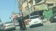 קטנוע מבצע ירי לעבר בית עסק מקומי ליד צומת הפיקוד בנצרת