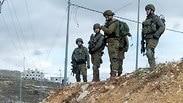 אלוף-משנה שרון אסמן מפקד חטיבת בנימים בזירת הפיגוע