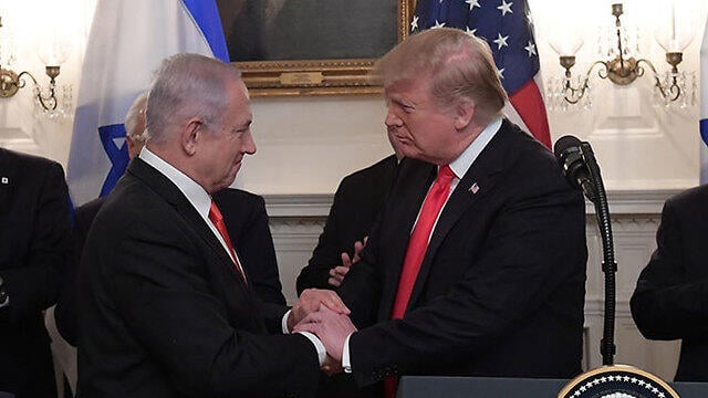 Benjamin Netanyahu meeting with close ally Donald Trump at the White House in 2019 