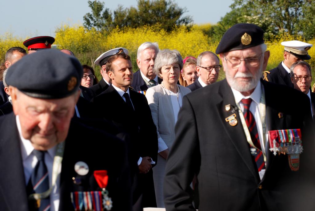 Macron and May join veterans at a ceremony in Ver-Sur-Mer to mark the 75th anniversary of D-Day, June 6, 2019 (Photo: Reuters) Macron May d-day