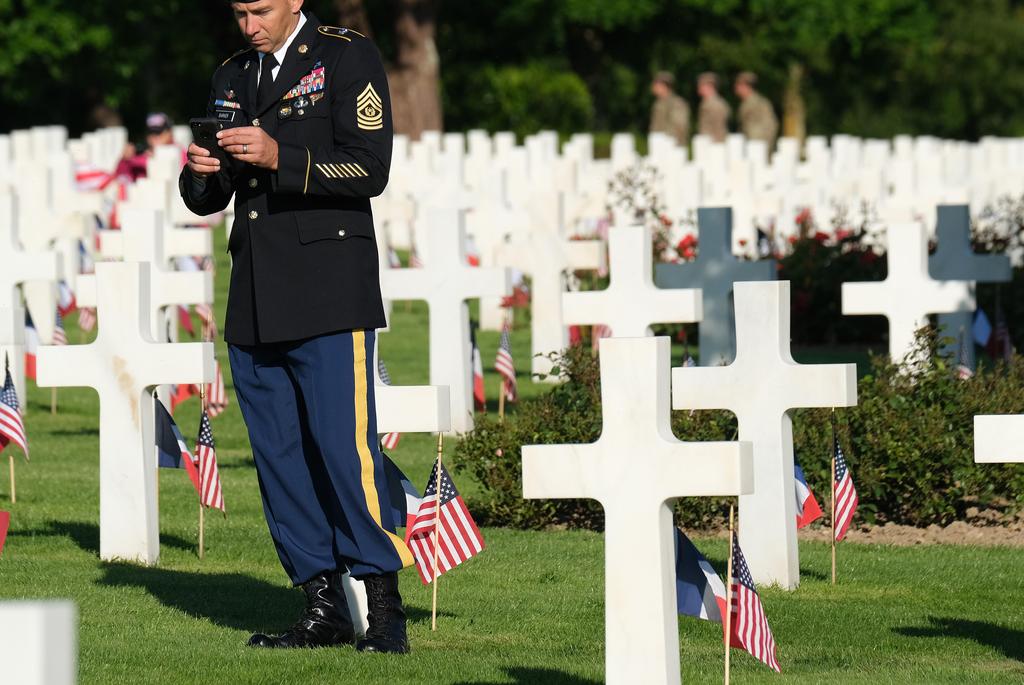 Command Sgt. Maj. Bryan Barker at the Normandy American Cemetery near Colleville-Sur-Mer on the 75th anniversary of D-Day, June 6, 2019 (Photo: Getty Images) d-day france