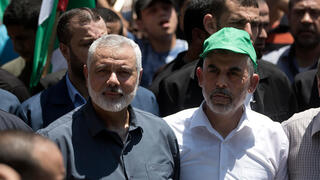 Hamas leader Ismail Haniyeh and Yahya Sinwar 