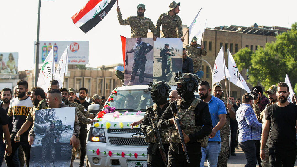 Pro-Iranian militias (Photo: AFP) עיראק מיליציה אל חשד א שעבי בגדד