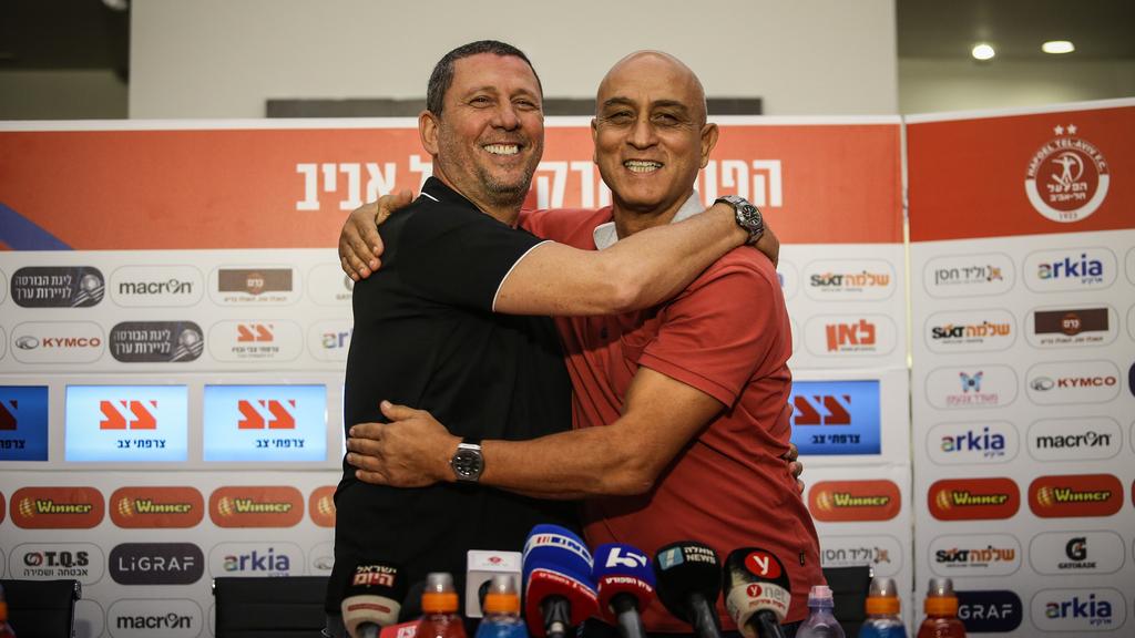 "לא מתערב לו מקצועית". סיני עם קלינגר (צילום: עוז מועלם) קלינגר וסיני