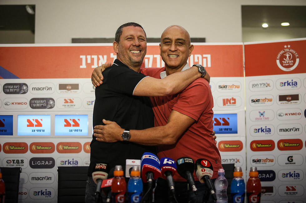 כבר פחות מחויכים. קלינגר וסיני (צילום: עוז מועלם) קלינגר וסיני