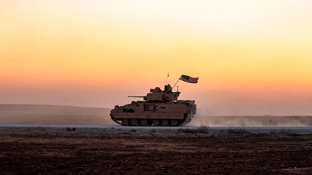An American APC in Syria (Photo: AFP) רכב צבאי אמריקני ב תל תאמר סוריה ליד גבול טורקיה