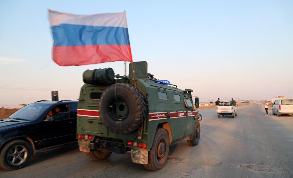 Russian military police forces patrol an area at Qamishli, northern Syria, Oct. 26 2019 