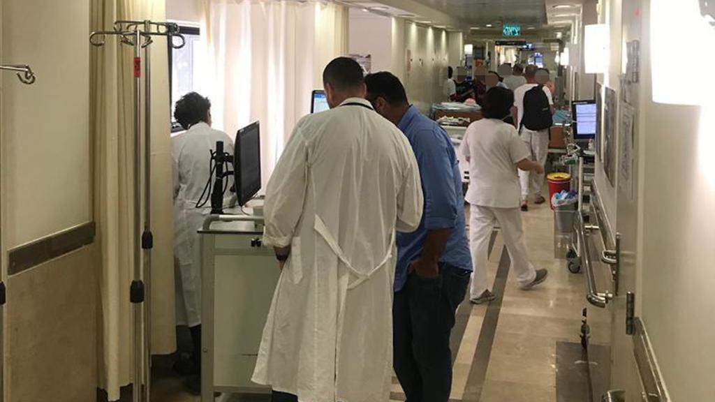 Patients being admitted in the hallway of an Israeli hospital (Photo: Courtesy) Patients being admitted in the hallway of an Israeli hospital