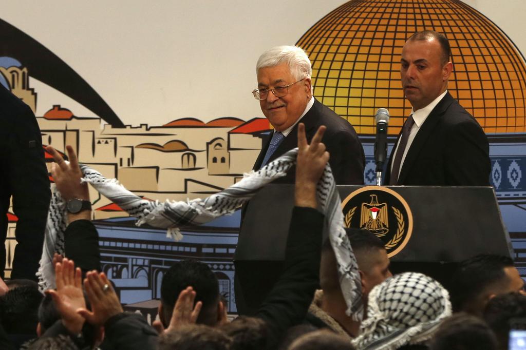 Palestinian President Mahmoud Abbas attends a ceremony marking the 55th foundation anniversary of the Fatah movement in the West Bank city of Ramallah. Dec. 31, 2019 