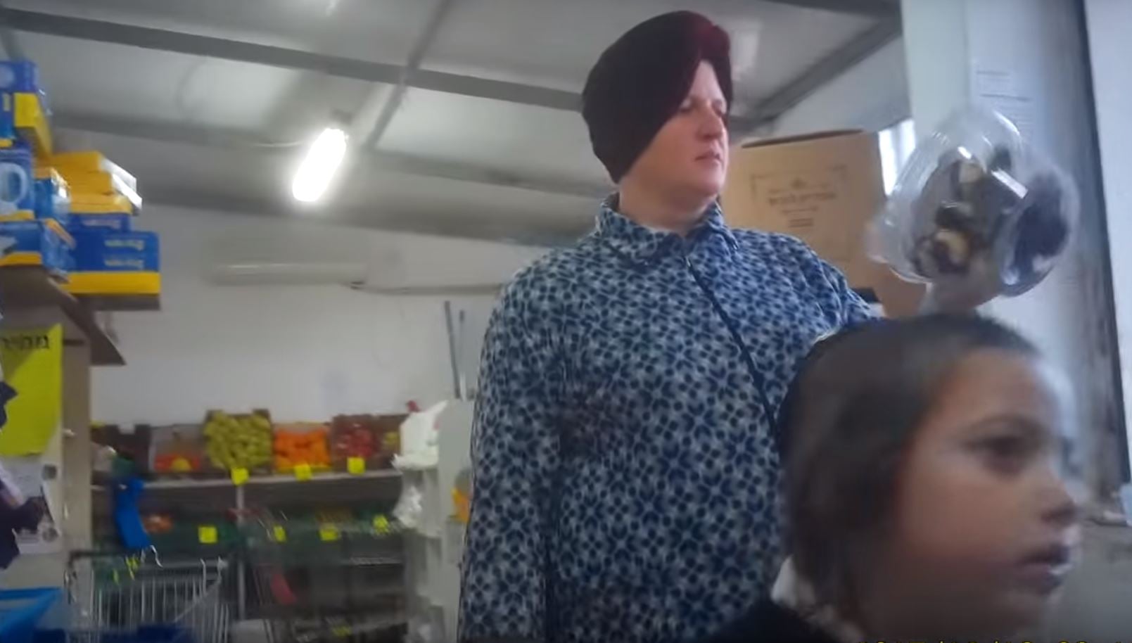 Malka Leifer is caught on camera while out shopping despite her claims of mental instability (Photo: YouTube screenshot) Malka Leifer is caught on camera while out shopping despite her claims of mental instability