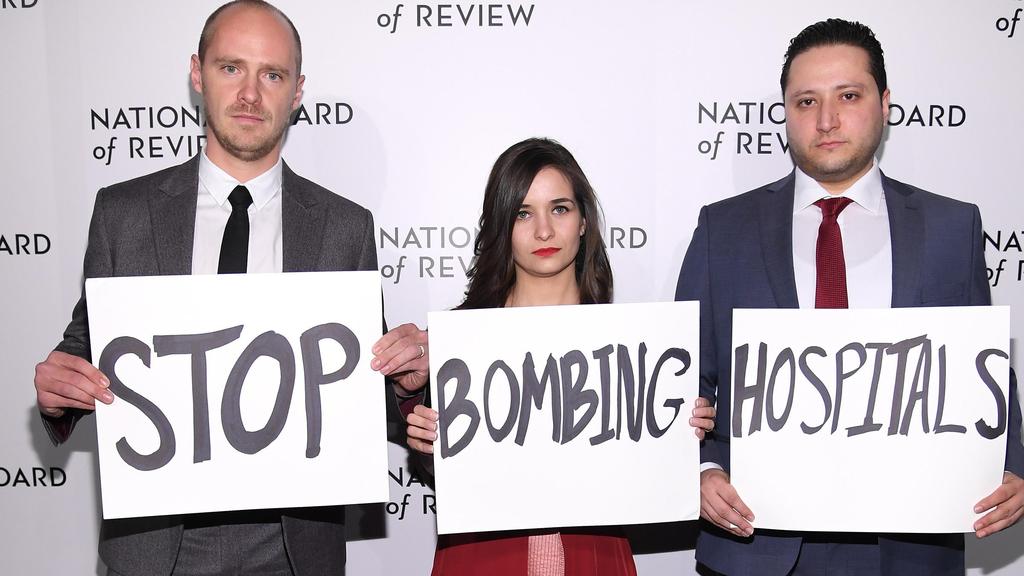 Edward Watts, Waad al-Kateab, and Hamza al-Kateab attend Awards Gala 