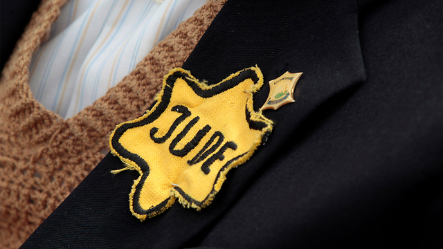 Yellow badge designed to distinguish Jews from the general population during the Nazi regime