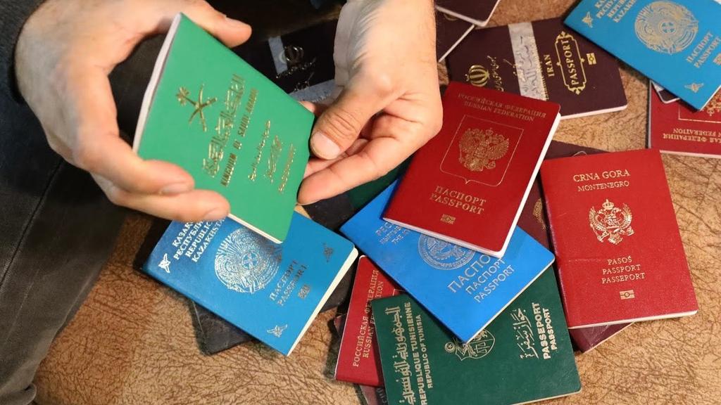A Kurdish official shows the passports of captured foreign Islamic State fighters (Photo: Reuters) A Kurdish official shows the passports of captured foreign Islamic State fighters