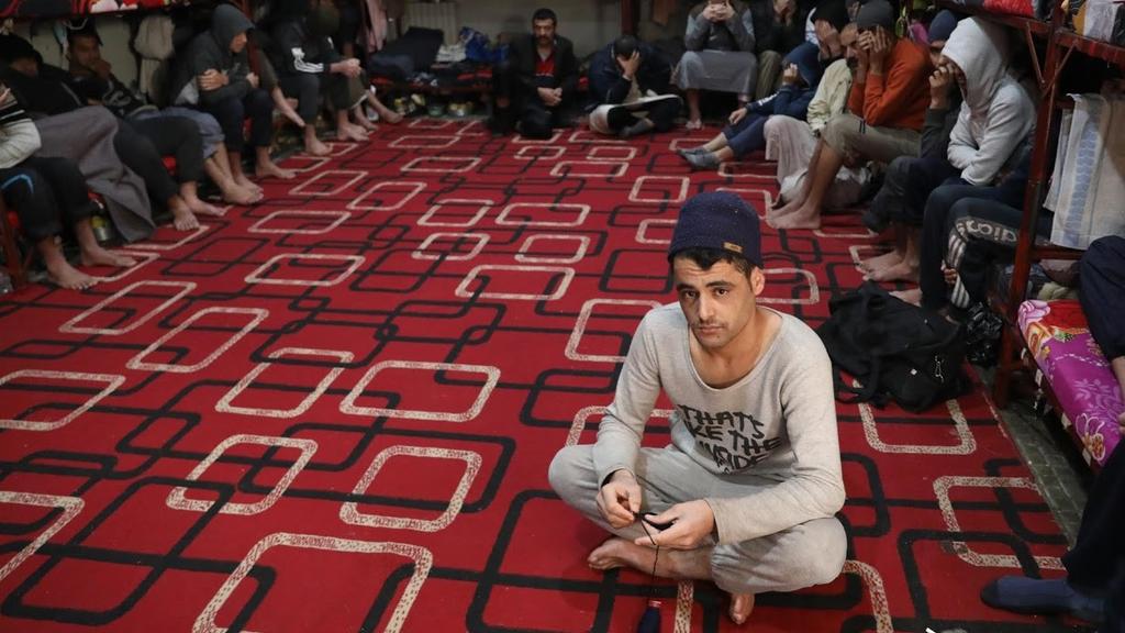 Prisoners from Iraq and Syria sit inside a prison cell in Hasaka (Photo: Reuters) Prisoners from Iraq and Syria sit inside a prison cell in Hasaka