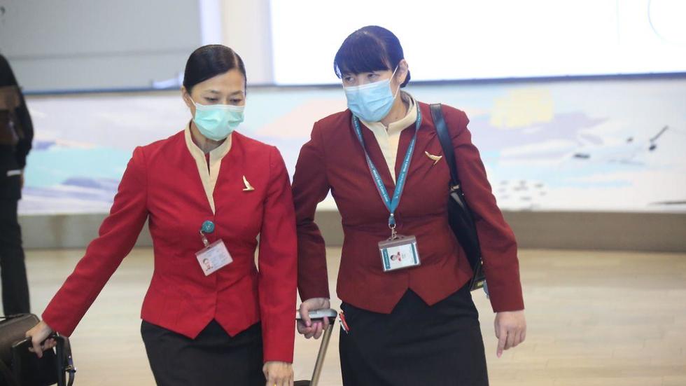 Airline staff from Hong Kong arriving at Ben-Gurion Airport on Monday (Photo: Moti Kimchi) Airline staff from Hong Kong arriving at Ben-Gurion Airport on Monday