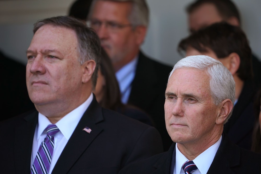 Mike Pomepo and Mike Pence (Photo: AFP) Mike Pomepo and Mike Pence