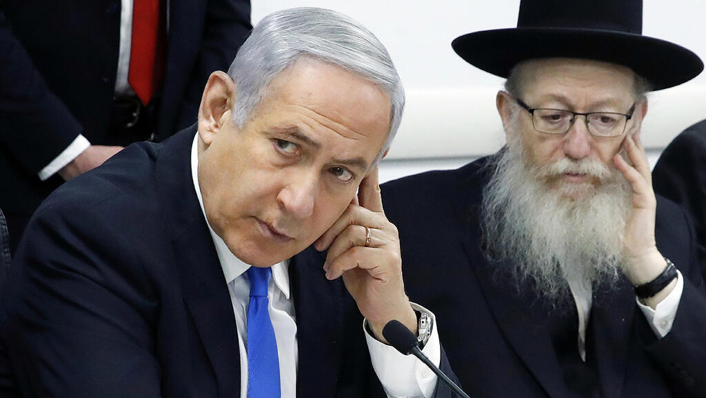 Former prime minister Benjamin Netanyahu with his Health Minister Yaakov Litzman in 2020 (Photo: Reuters) בנימין נתניהו יעקב ליצמן הערכת מצב נגיף קורונה משרד הבריאות