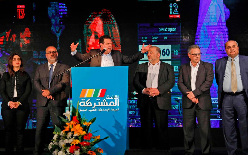 Joint List leaders celebrate their strong showing in the March 2 election after the exit polls were released. (Photo: AFP) איימן עודה