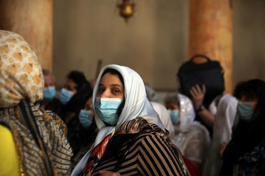 Visitors wear protective masks in Bethlehem amid coronavirus crisis 