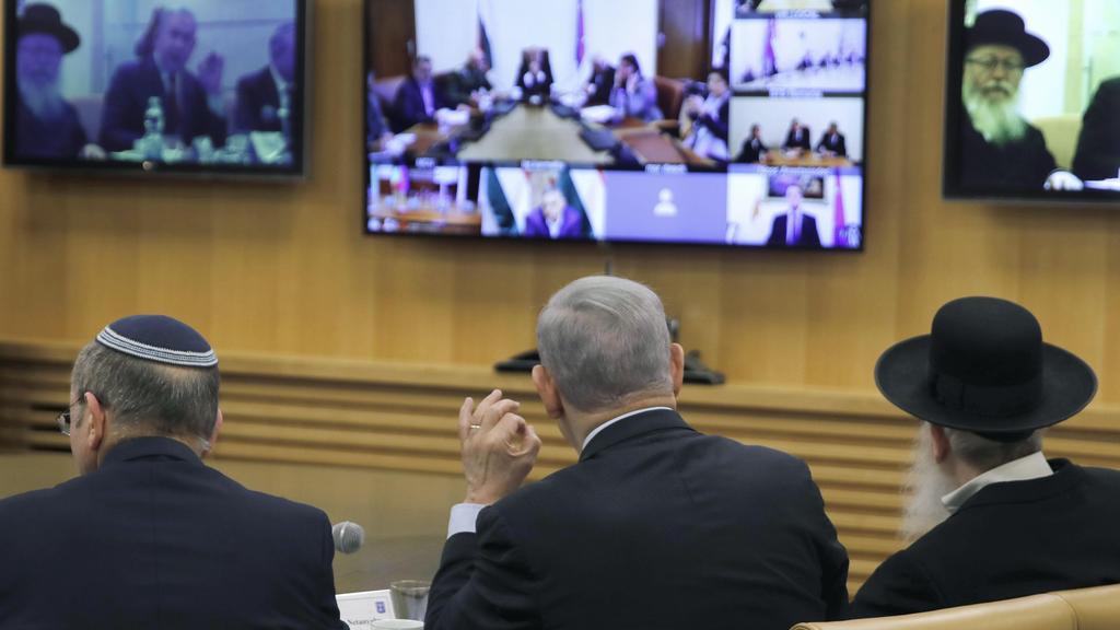 L-R: National Security Adviser Meir Ben-Shabbat, PM Benjamin Netanyahu and Health Minister Yaakov Litzman hold a coronavirus video conference from Jerusalem with European leaders, March 9, 2020 
