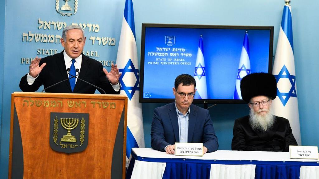 L-R: PM Benjamin Netanyhau, Health Ministry DG Moshe Bar-Siman-Tov and Health Minister Yaakov Lizman address the public during the coronavirus crisis 