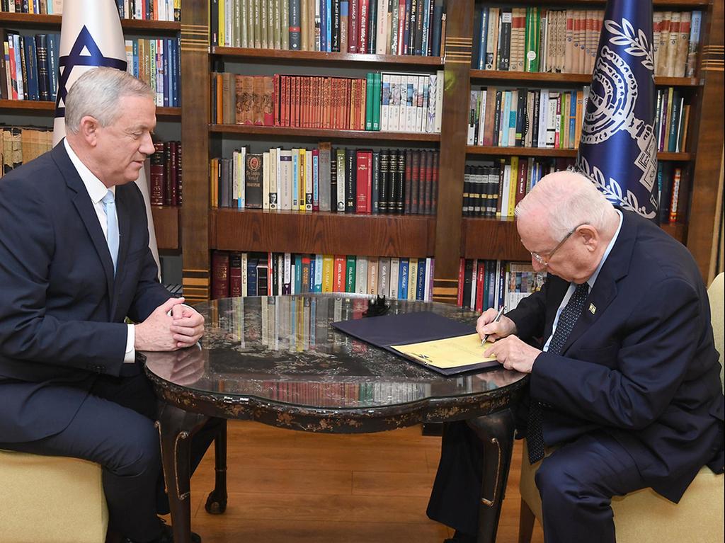 Benny Gantz receives a mandate from President Rivlin to form a new coalition government (Photo: GPO) ראובן ריבלין ובני גנץ