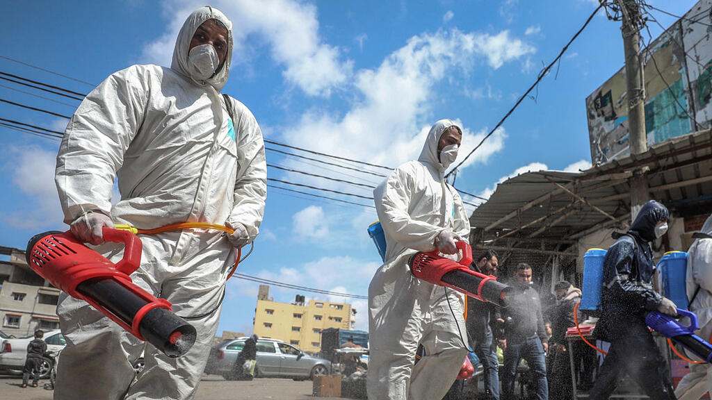 Disinfecting the streets of Gaza (Photo: EPA) Disinfecting the streets of Gaza