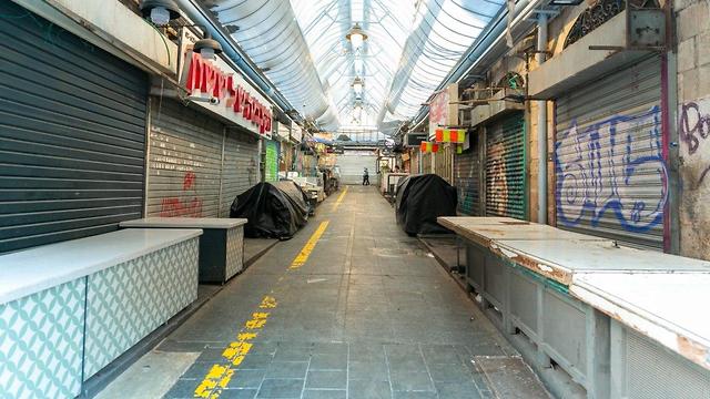 Jerusalem's Mahane Yehuda market is shuttered during coronavirus outbreak (Photo: TPS) Jerusalem's Mahane Yehuda market is shuttered during coronavirus outbreak
