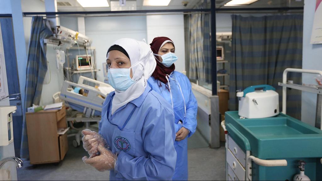 Disinfection in one of Damascus' hospitals (Photo: EPA) חיטוי ב דמשק סוריה נגיף קורונה