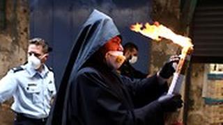 נרות שהודלקו מהאש הקדושה