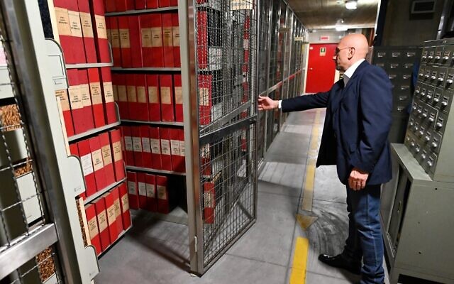 An attendant opens the section of the archive dedicated to Pope Pius XII 