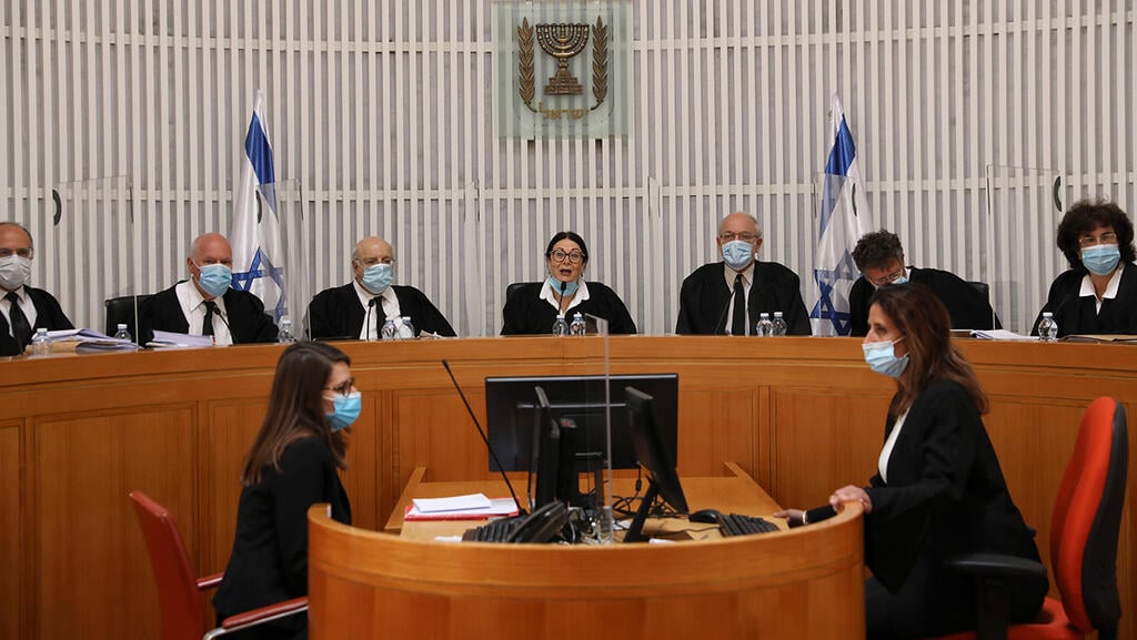 The panel of 11 judges (Photo: EPA) בג"ץ דן בהסכם הקואליציוני שנחתם בין הליכוד לכחול לבן