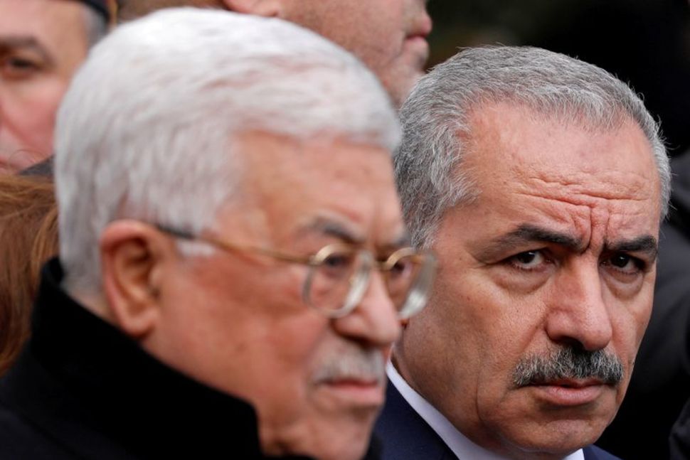 Palestinian Prime Minister Mohammad Shtayyeh and President Mahmoud Abbas attend the funeral of former senior Fatah official Ahmed Abdel Rahman, in Ramallah (Photo: Reuters) Palestinian Prime Minister Mohammad Shtayyeh and President Mahmoud Abbas attend the funeral of former senior Fatah official Ahmed Abdel Rahman, in Ramallah