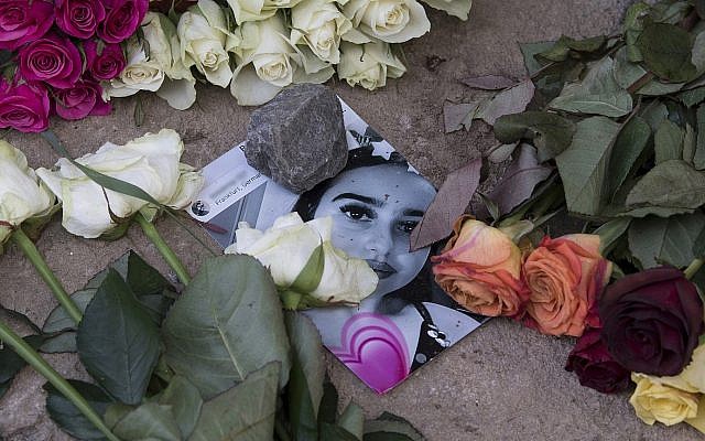 Roses cover the photo of the 14-year-old Susanna Maria Feldman killed in Wiesbaden, Germany (Photo: Associated Press) Roses cover the photo of the 14-year-old Susanna Maria Feldman killed in Wiesbaden, Germany