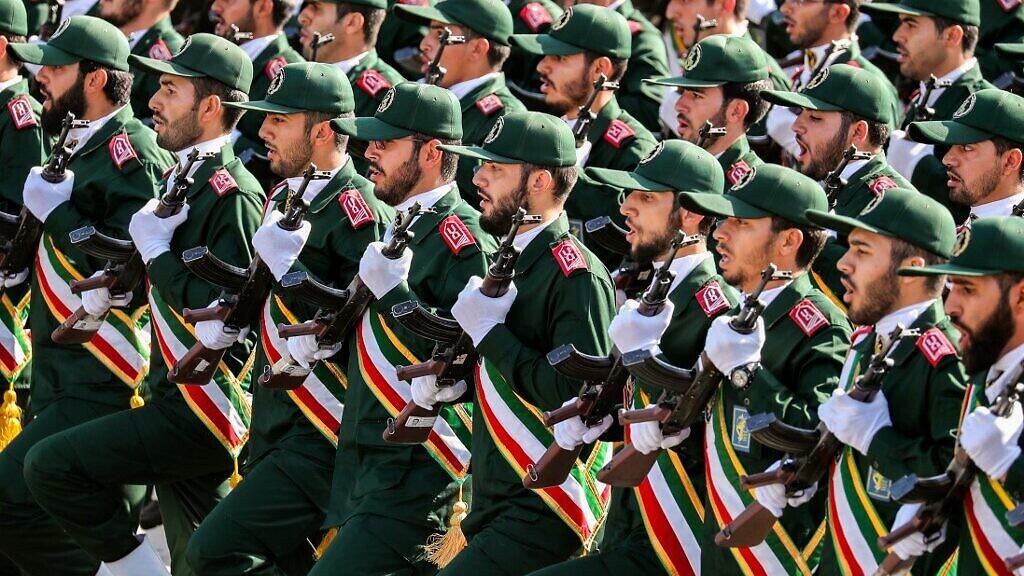 Members of Iran’s Islamic Revolutionary Guard Corps (IRGC) march during the annual military parade marking the anniversary of the outbreak of the devastating 1980-1988 war with Saddam Hussein’s Iraq, in the capital Tehran 