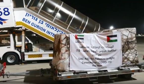 Cargo from the UAE is taken off a Etihad Airways flight to Ben-Gurion Airport on Tuesday  