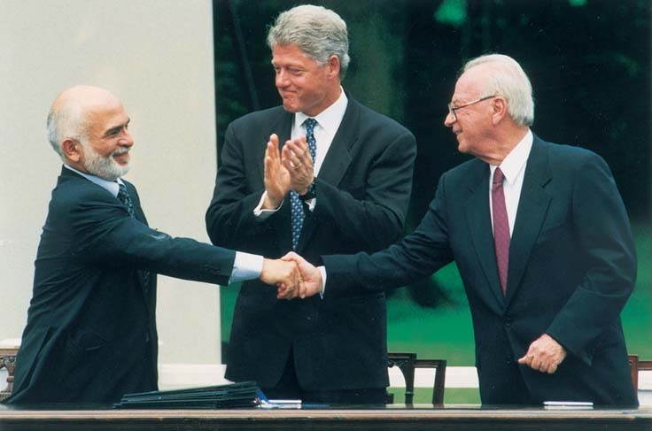 King Hussein of Jordan, U.S. President Bill Clinton and Prime Minister Yitzhak Rabin at the signing of the bilateral peace treaty at the White House, July 25, 1994 