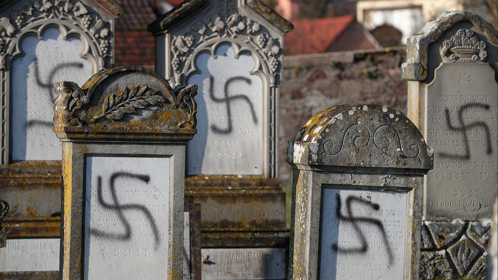 A Jewish cemetery is defaced with swastikas 