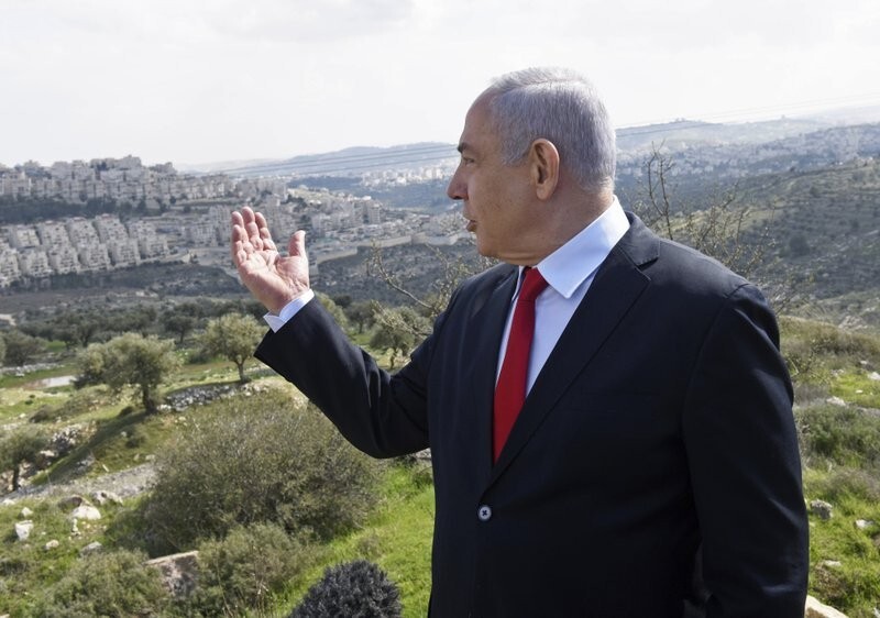 Prime Minister Benjamin Netanyahu visits the area where a new neighborhood is to be built in the East Jerusalem settlement of Har Homa 