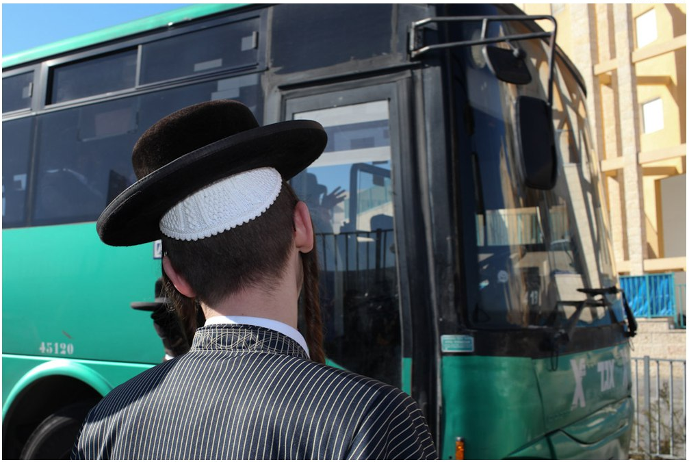 Ultra-Orthodox men boarding a bus in Beit Shemesh 