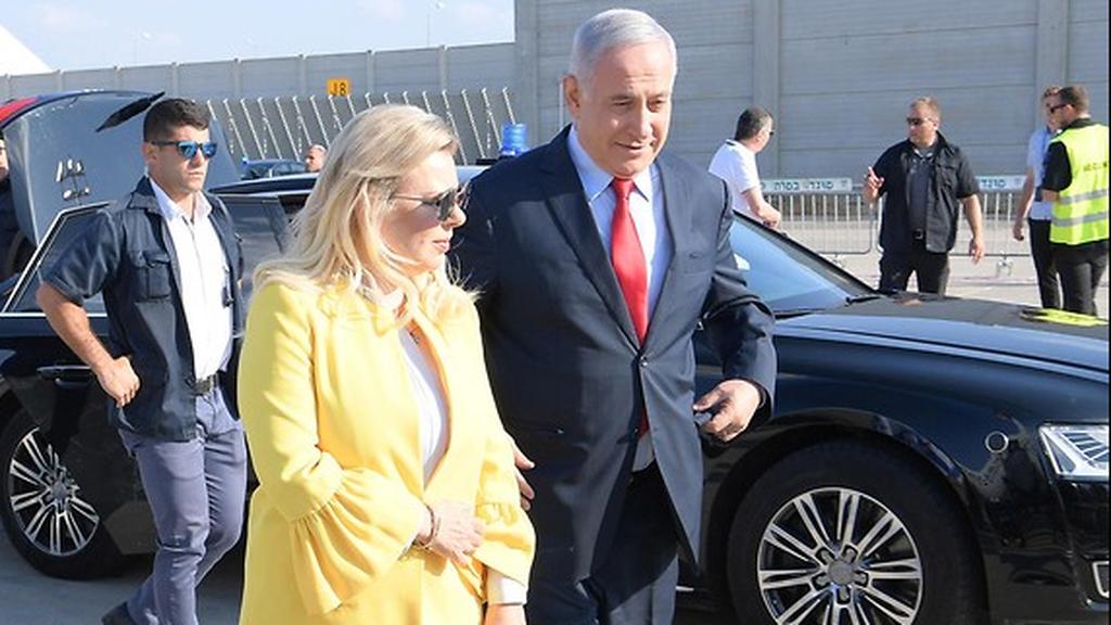 Benjamin and Sara Netanyahu with the prime minister's service car 