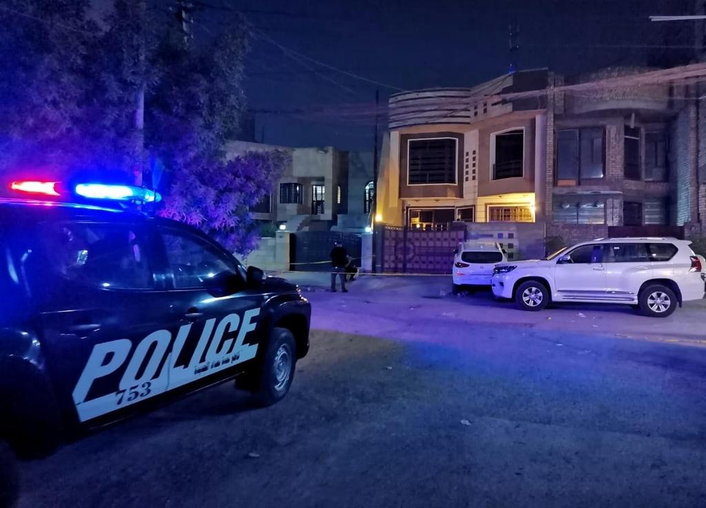 מתנקשים על אופנוע. זירת הרצח בבגדד (צילום: AP) זירת הרצח של הישאם אל-האשמי בבגדד