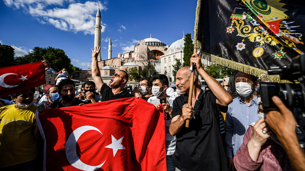  Turks celebrate the decision to transform the Hagia Sophia in Istanbul into a mosque 