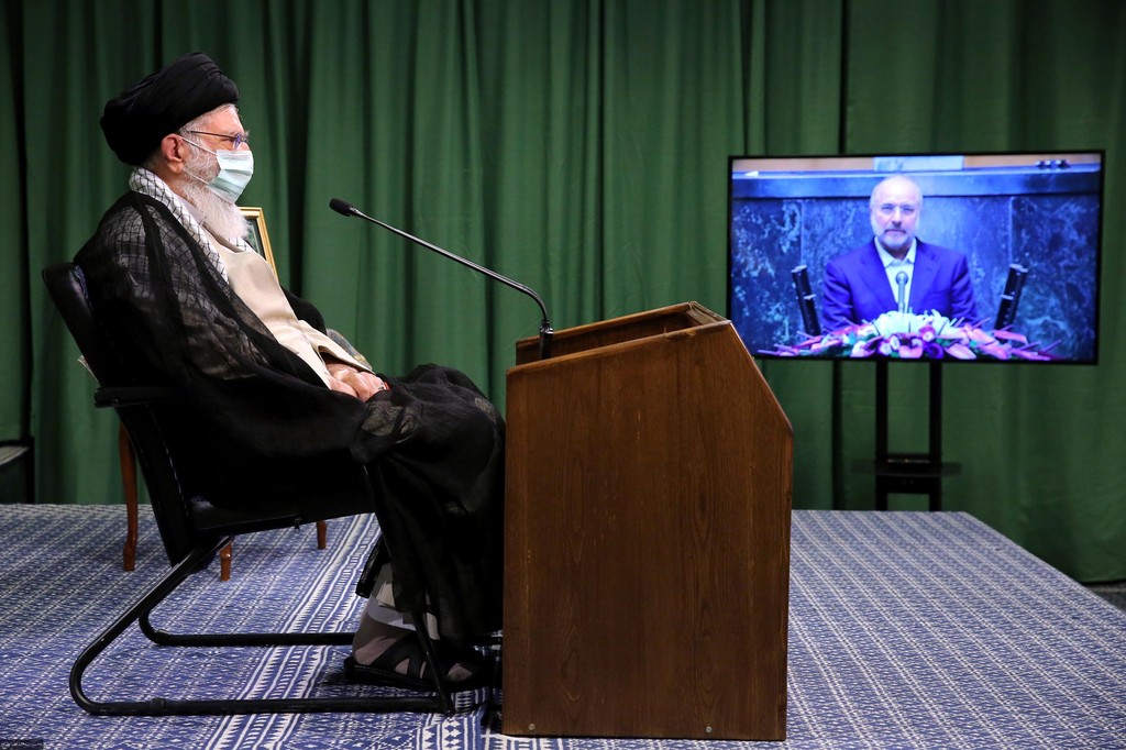 Iranian Supreme Leader Ali Khamenei wears a protective face mask while making an address during the coronavirus pandemic 